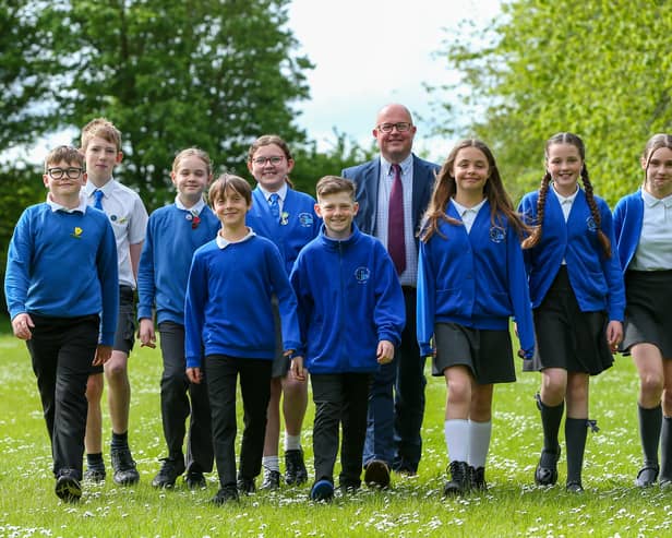 Headteacher Mr Justin Bartlett with Heads of House. Castle Primary School, Portchester, has been rated as Outstanding in their latest Ofsted report
Picture: Chris  Moorhouse (030524-09)
