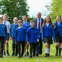 Headteacher Mr Justin Bartlett with Heads of House. Castle Primary School, Portchester, has been rated as Outstanding in their latest Ofsted report
Picture: Chris  Moorhouse (030524-09)