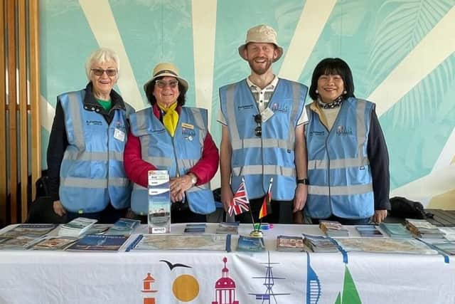 Port ambassadors greeting guests aboard MS Deutschland as they visit Portsmouth. From left: Cheryl Jewitt, Vanessa Bussfield, James Donougher and Marisa Armstrong.