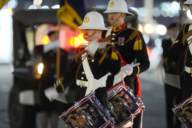 The Royal Marines Corps of Drums performed at the closing ceremony where the eternal flame of France went on its next journey. Picture: Sarah Standing (140524-8957)