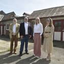 Carpenter's Yard in Priddy's Hard is going to be transformed into an artists quarter for Gosport residents. Pictured is: (l-r) Phil Gibby, South West director for Arts Council England, Darren Henley, chief executive of Arts Council England, Gosport MP Dame Caroline Dinenage and Hannah Prowse, chief executive at Portsmouth Historic Quarter. Picture: Sarah Standing (100524-2246)