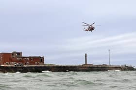 RNLI volunteers have rescued a 22-year-old who  found herself injured and in the water near Fraser Range.
Due to 'challenging' conditons, she had to airlifted out of the water. 
Picture: RNLI/ Luke Kierman