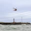 RNLI volunteers have rescued a 22-year-old who  found herself injured and in the water near Fraser Range.
Due to 'challenging' conditons, she had to airlifted out of the water. 
Picture: RNLI/ Luke Kierman