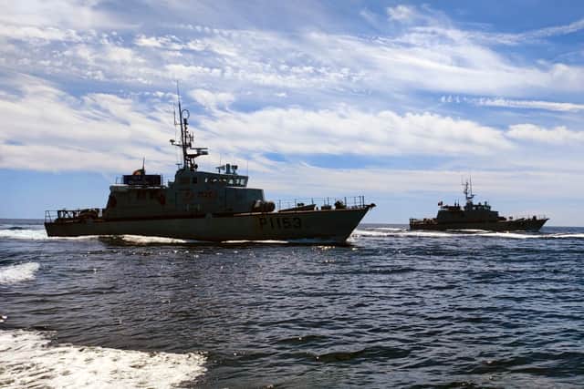HMS Cutlass, with the Gibraltar Squadron, far right leads the two Portuguese patrol boats on manoeuvres.