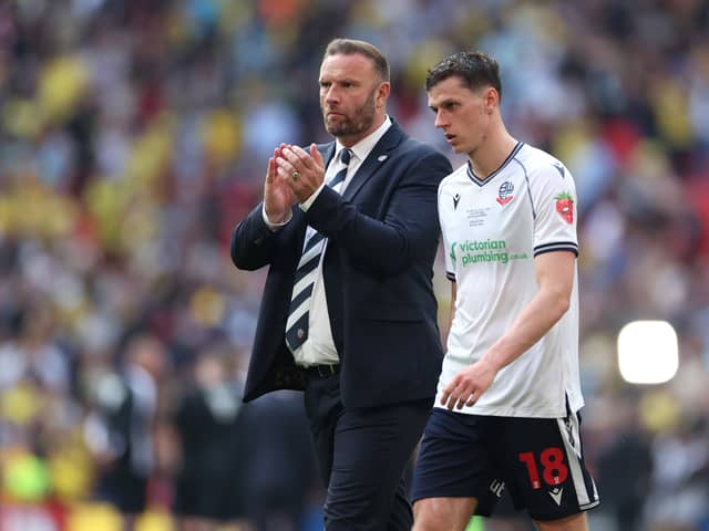 Bolton boss Ian Evatt with defender Eoin Toal after their Wembley play-off final defeat to Oxford United. Pic: Getty.
