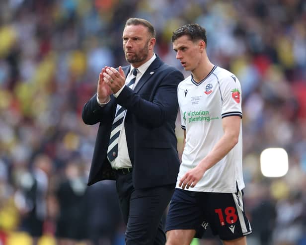 Bolton boss Ian Evatt with defender Eoin Toal after their Wembley play-off final defeat to Oxford United. Pic: Getty.