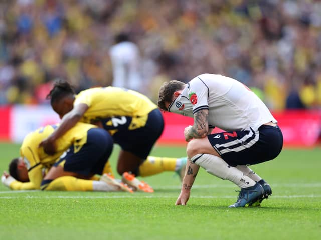 Bolton's Gethin Jones is dejected following their 2-0 defeat in the League One play-off final to Oxford United. Picture: Michael Steele/Getty Images