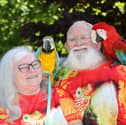 Spider, 66, and Anne Spider-McKeown, 64, from Birmingham, go about their daily routine with two parrots Charlie a green-winged Macaw and Chester, a blue-and-gold Macaw. May 19, 2024. 