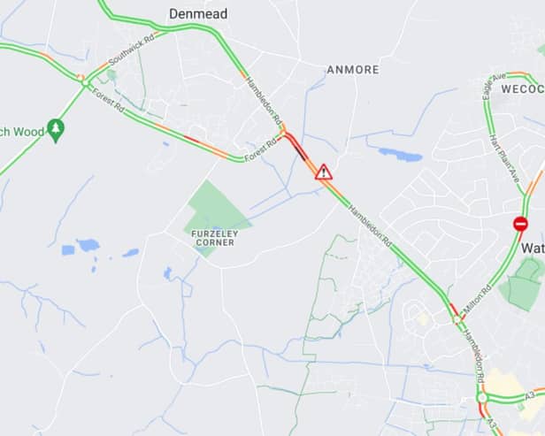 A road in Denmead has been blocked in both directions following a collision. 