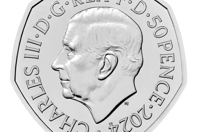 A D-Day 80th anniversary 50p coin obverse. Designed by David Lawrence and supported by the experts at the Imperial War Museums, the design portrays Allied soldiers landing in Normandy. Picture: Royal Mint/PA Wire.