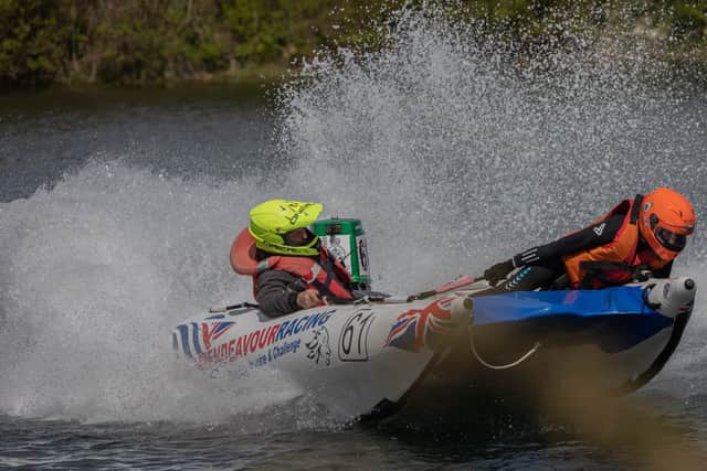 Brian McGuffie racing alongside one of his teammates with Team Endeavour Racing. He supports veterans who have fallen on hard times alongside the charity, in a bid to bring them back into society. Picture: Whendie Backwell
