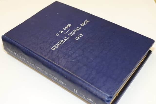 Photo issued by Oxfam of a General Signal Book 1917, a very rare lead-lined naval signal book from the First World War which has been bought by a museum after being found in an Oxfam bookshop. The book, which is filled with confidential signals, was found with a box of donations at the back of Oxfam's Bath bookshop by the shop manager Simon Berry. 

Photo credit should read: Oxfam/PA Wire 