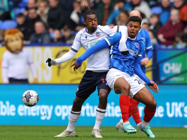 Bolton's Paris Maghoma battles Pompey midfielder Tino Anjorin for the ball during the Blues' trip to the Toughsheet Community Stadium in April