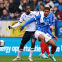 Bolton's Paris Maghoma battles Pompey midfielder Tino Anjorin for the ball during the Blues' trip to the Toughsheet Community Stadium in April