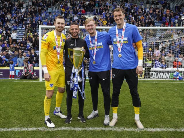 Matt Macey (far right) celebrates winning the League One title with Will Norris, goalkeeping coach Joe Prodomo and Ryan Schofield. Picture: Jason Brown/ProSportsImages