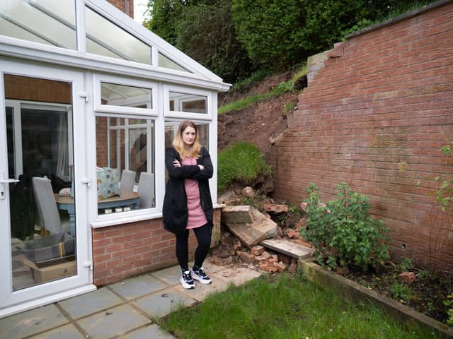 Lucy Gawthorpe at her home where a wall has collapsed. 