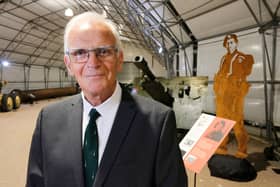 Howard Bidmead alongside the figure depicting his father Bill, who served during D-Day and was one of the soldiers to return from the attacks in 1944. Picture: Matt Scott-Joynt