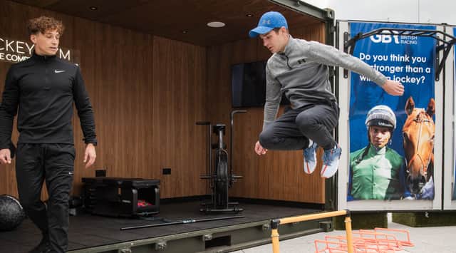 James Adams puts Charlie Bishop through his paces at the pop-up Jockey Gym in Gunwharf Quays.  Photo: Dave Dodge/PA Media Assignments