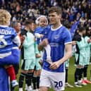 Sean Raggett walking out onto the Fratton Park pitch as a Pompey player ahead of the game against Wigan on April 20