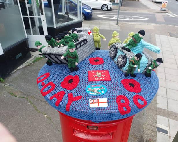 Baffin Yarnbombers have put out their latest post box topper creation - a D-Day 80 commemoration