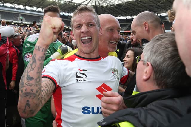 Carl Baker won promotion to the Championship with MK Dons in May 2015.