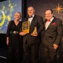 A pub manager from Portsmouth is celebrating after winning the Best Community Story award at this year’s Pride of Greene King Awards.

Pictured: Scott Donnelly (middle) with Shaun Williamson (right) and managing director for Greene King Pubs, Clair Preston-Beer (left) 

Picture Credit: Will Johnston Photography