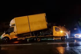 Police pulled over a car due to 'shocking attempt' of a car recovery which drove on major roads. 