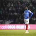 Former Pompey midfielder Jay Mingi appears out of the the first-team frame for Stockport’s League One play-off semi-final second leg against Leyton Orient.