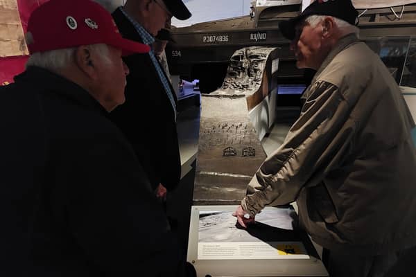 Steven Melnikoff, 104, talks through the D-Day landings to his fellow veterans.