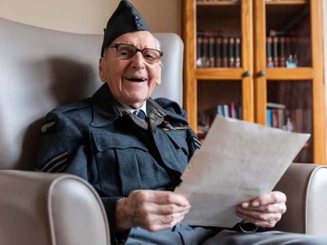 D-Day veteran Bernard Morgan reads historic note revealing end of WW2 in Europe.