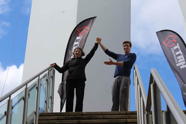 Robina and James celebrate completing the charity abseil of the Spinnaker Tower on behalf of Portsmouth Bowel Cancer Appeal.