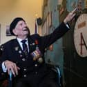 Normandy veteran George Chandler, 99, poses for a photograph in the Map room at Southwick House, during an event hosted by the Spirit of Normandy Trust and D-Day Revisited at Southwick House, the nerve centre of D-Day operations 80 years ago