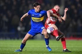 Pompey-born Armani Little (left) battles for possession with Ramsgate's Benedict Bioletti in the FA Cup in December 2023. Picture: Justin Setterfield/Getty Images