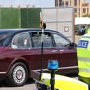 King Charles and Queen Camilla waved to the crowds in Portsmouth