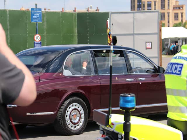 King Charles and Queen Camilla waved to the crowds in Portsmouth