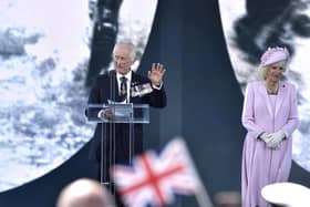 HRH King Charles and Queen Camilla on stage during the D-Day 80 commemorations on Southsea Common on June 5. Picture: Sarah Standing (050624-3671)