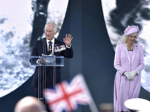 HRH King Charles and Queen Camilla on stage during the D-Day 80 commemorations on Southsea Common on June 5. Picture: Sarah Standing (050624-3671)