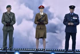 Captain Lewis Kelly represented the Royal Navy alongside members of all Armed Forces during the D-Day 80 commemorations on Southsea Common.

Pictured is: (l-r) Cpt Lewis Kelly (Royal Marines), Lt Felicity Villar (Army) and FS Dai Lawrence (RAF).

Picture: Sarah Standing (050624-3642)