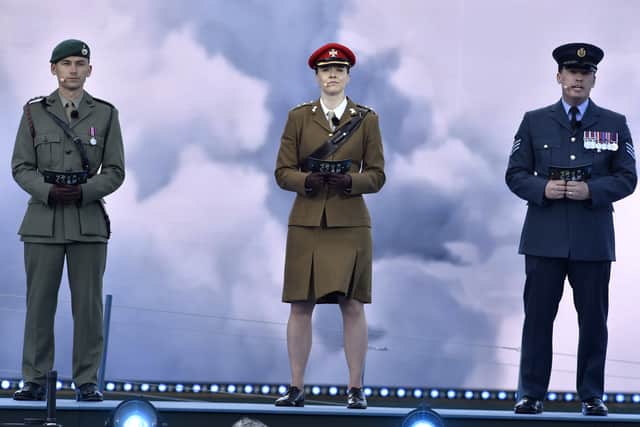 Captain Lewis Kelly represented the Royal Navy alongside members of all Armed Forces during the D-Day 80 commemorations on Southsea Common. Pictured is: (l-r) Cpt Lewis Kelly (Royal Marines), Lt Felicity Villar (Army) and FS Dai Lawrence (RAF). Picture: Sarah Standing (050624-3642)