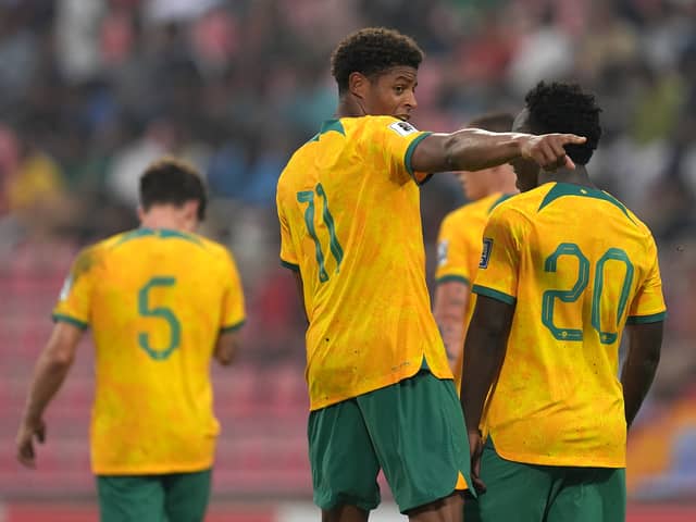 Pompey striker Kusini Yengi celebrates scoring Australia's second goal in their FIFA World Cup Asian qualifier Group I match against Bangladesh at Bashundhara Kings Arena.