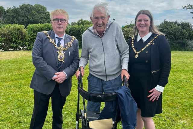 Arthur Reading, 99, A D-Day veteran, helped young people to clean up the beaches in Southsea ahead of the Normandy Landings commemorations. Pictured is Arthur in the middle of the Lord Mayor and Mayoress of Portsmouth.