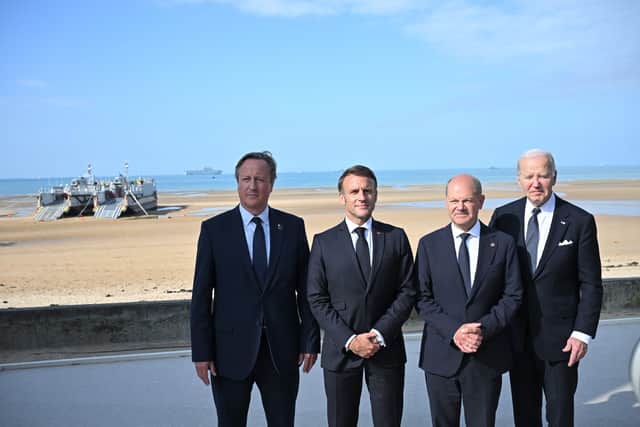From left: Foreign Secretary Lord David Cameron, French President Emmanuel Macron, German Chancellor Olaf Scholz and US President Joe Biden attending the D-Day 80 International Ceremony at Omaha Beach, Normandy, France. The foreign secretary attended the Normandy in the place of prime minister Rishi Sunak. Picture: Abaca Press/Alamy Live News/PA Wire