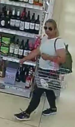 The force has released CCTV pictures of two people pictured at the scene of the incident, which involved one woman distracting the victim while the other took money from her bag.