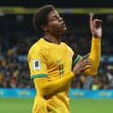 Pompey striker Kusini Yengi celebrates one of his two goals for the Socceroos in their 5-0 World Cup qualifying win over Palestine. Pic: Getty