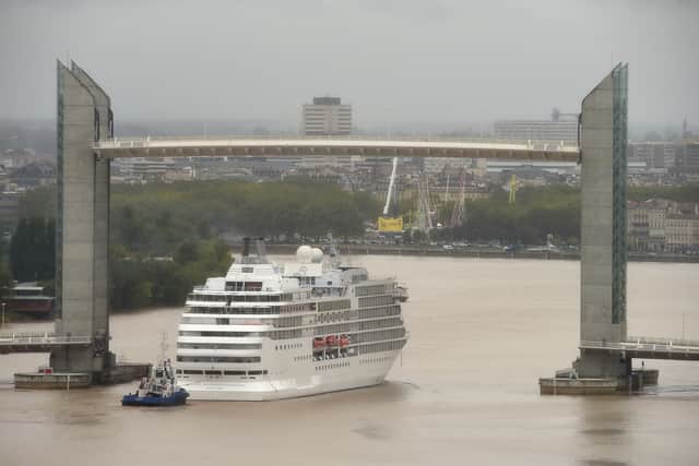 The tourist cruise ship Seven Seas Navigator will be visiting Portsmouth for the first time on June 13 while on a voyage across Western Europe. She appeared in the film After The Sunset in 2004. Pictured is the vessel in Bordeaux, France, on October 1, 2017. Picture: NICOLAS TUCAT/AFP via Getty Images.
