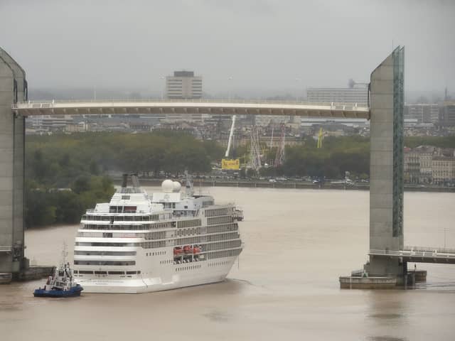 The tourist cruise ship Seven Seas Navigator will be visiting Portsmouth for the first time on June 13 while on a voyage across Western Europe. She appeared in the film After The Sunset in 2004. Pictured is the vessel in Bordeaux, France, on October 1, 2017. Picture: NICOLAS TUCAT/AFP via Getty Images.