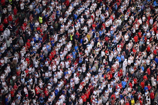 Football fans have been told to behave themselves by Hampshire police during Euro 2024 matches. Pictured are supporters during the FIFA World Cup Qatar 2022 quarter final match between England and France at Al Bayt Stadium, Qatar. Picture: Matthias Hangst/Getty Images.