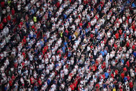 Football fans have been told to behave themselves by Hampshire police during Euro 2024 matches. Pictured are supporters during the FIFA World Cup Qatar 2022 quarter final match between England and France at Al Bayt Stadium, Qatar. Picture: Matthias Hangst/Getty Images.