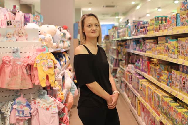 Businesses have been combining forces to clamp down on anti-social behaviour in Portsmouth City Centre, under the Portsmouth Eye radio scheme. Pictured is Stella Haines, area manager at Toy Town in Cascades Shopping Centre.