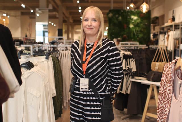 Businesses have been combining forces to clamp down on anti-social behaviour in Portsmouth City Centre, under the Portsmouth Eye radio scheme. Pictured is Rebecca Mudie, of Gosport, host at River Island in Commercial Road, Portsmouth.